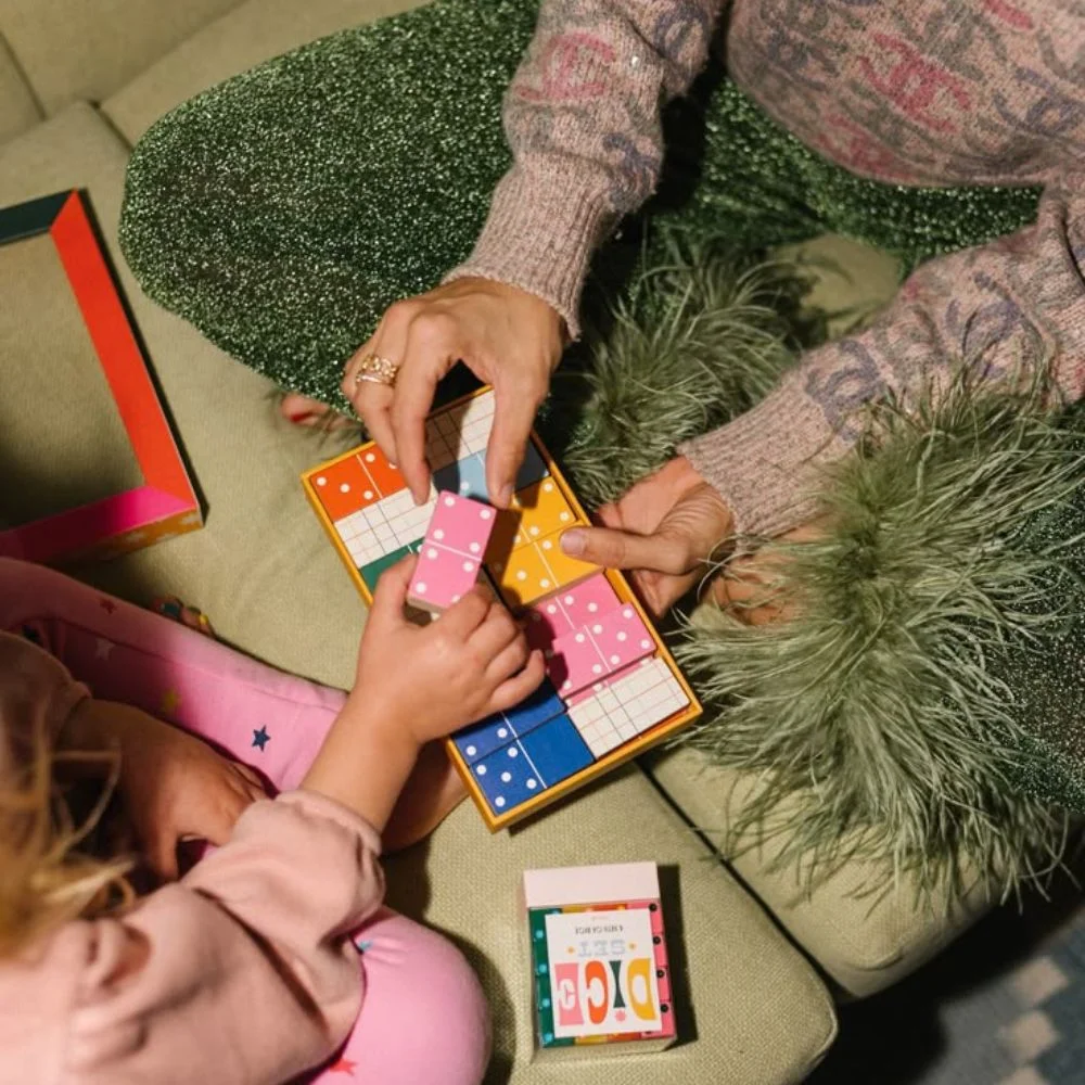 an image of dominoes playing with kids