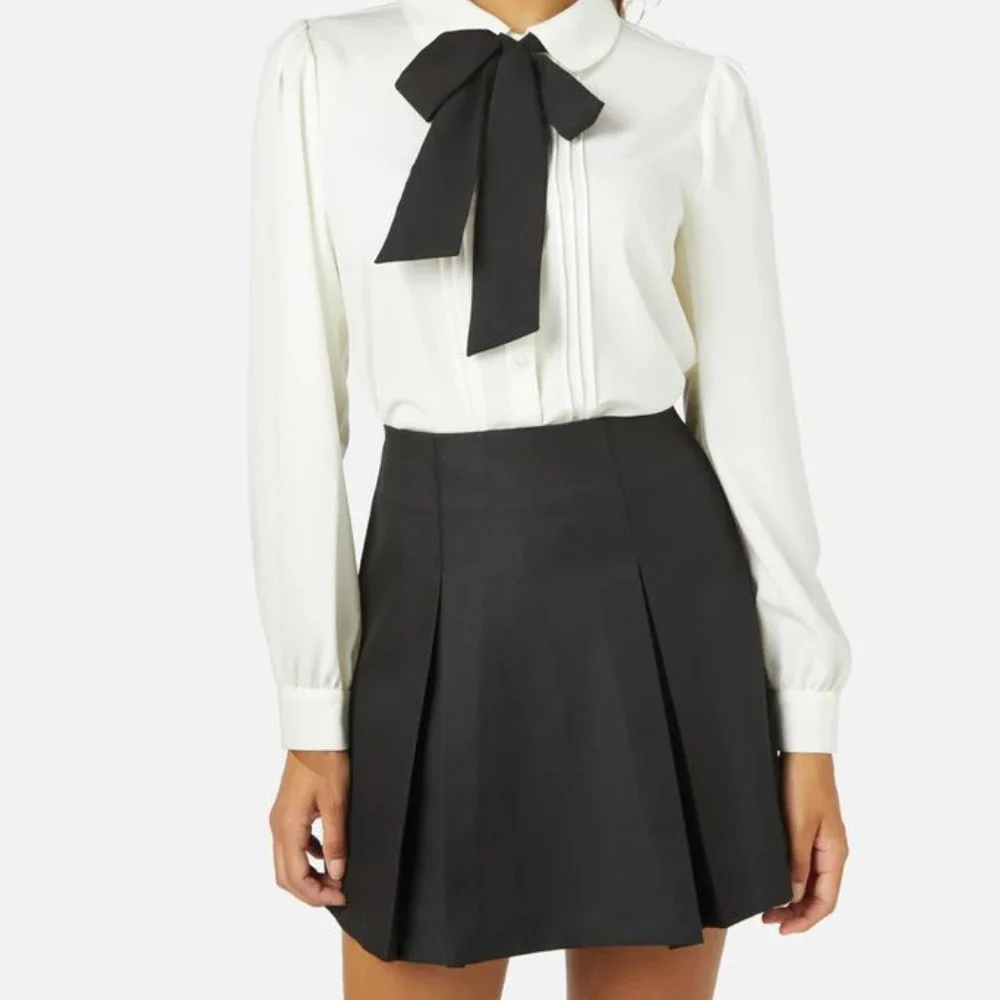 an image of Collared shirt, pleated skirt and slim tie
