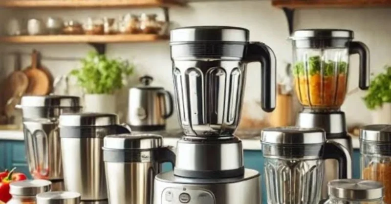 "Various kitchen mixer grinders with stainless steel and glass jars on a countertop"