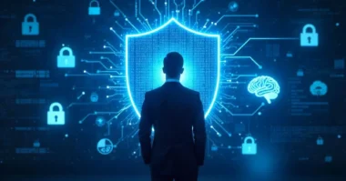 Business professional standing in front of digital cybersecurity shield.