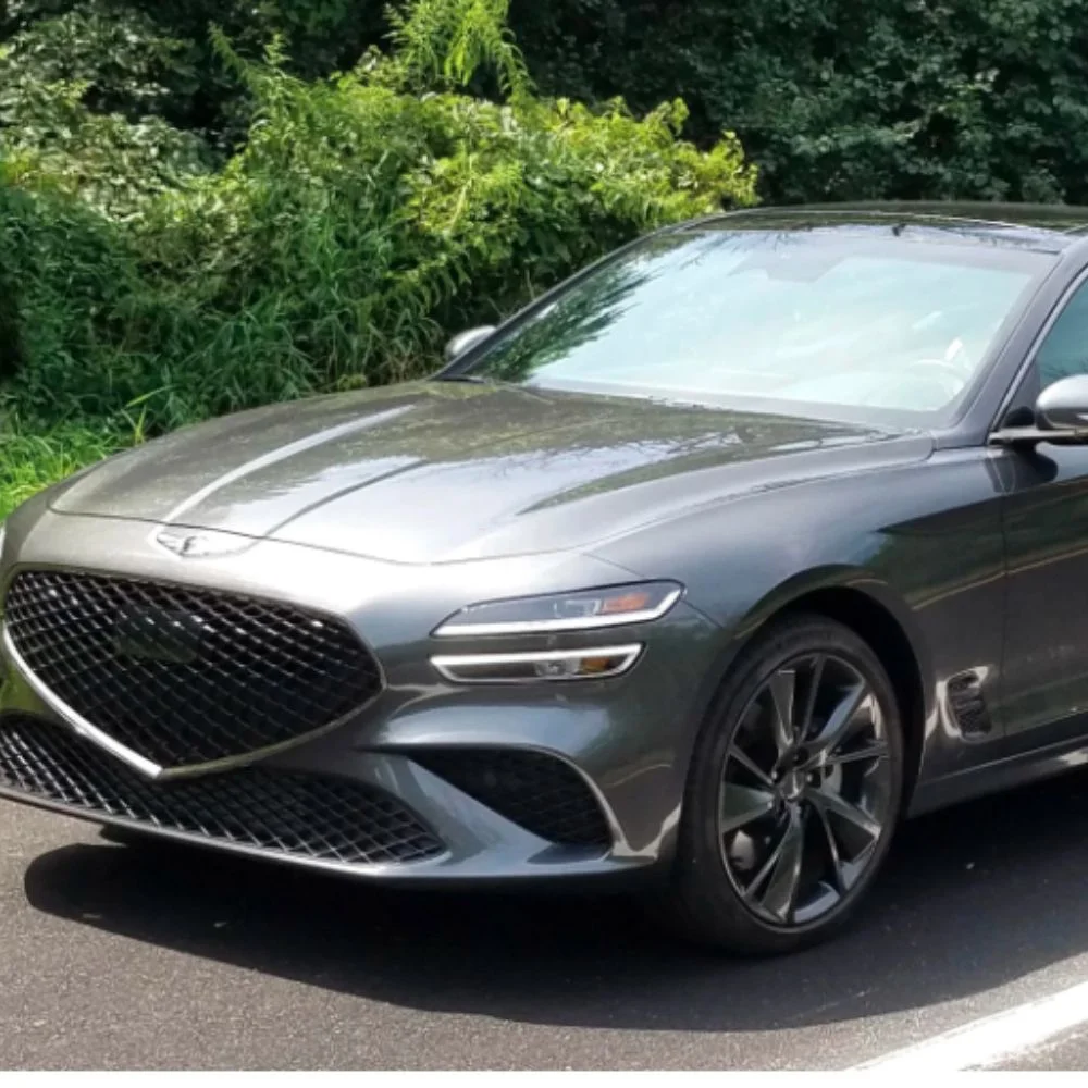  Sophisticated interior of the Genesis G70 3.3T Sport Advanced featuring performance-focused design, high-end finishes, and advanced technology.