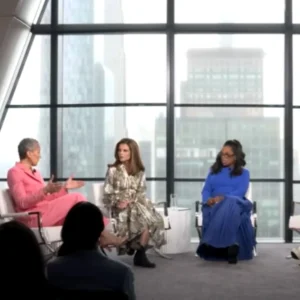 Oprah Winfrey in discussion with Maria Shriver and Naomi Watts during a collaborative interview on social issues.