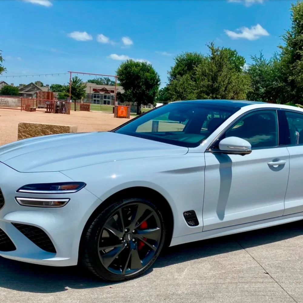 Premium interior of the Genesis G70 3.3T Sport Prestige with upscale materials, sport accents, and cutting-edge features for a luxurious driving experience.